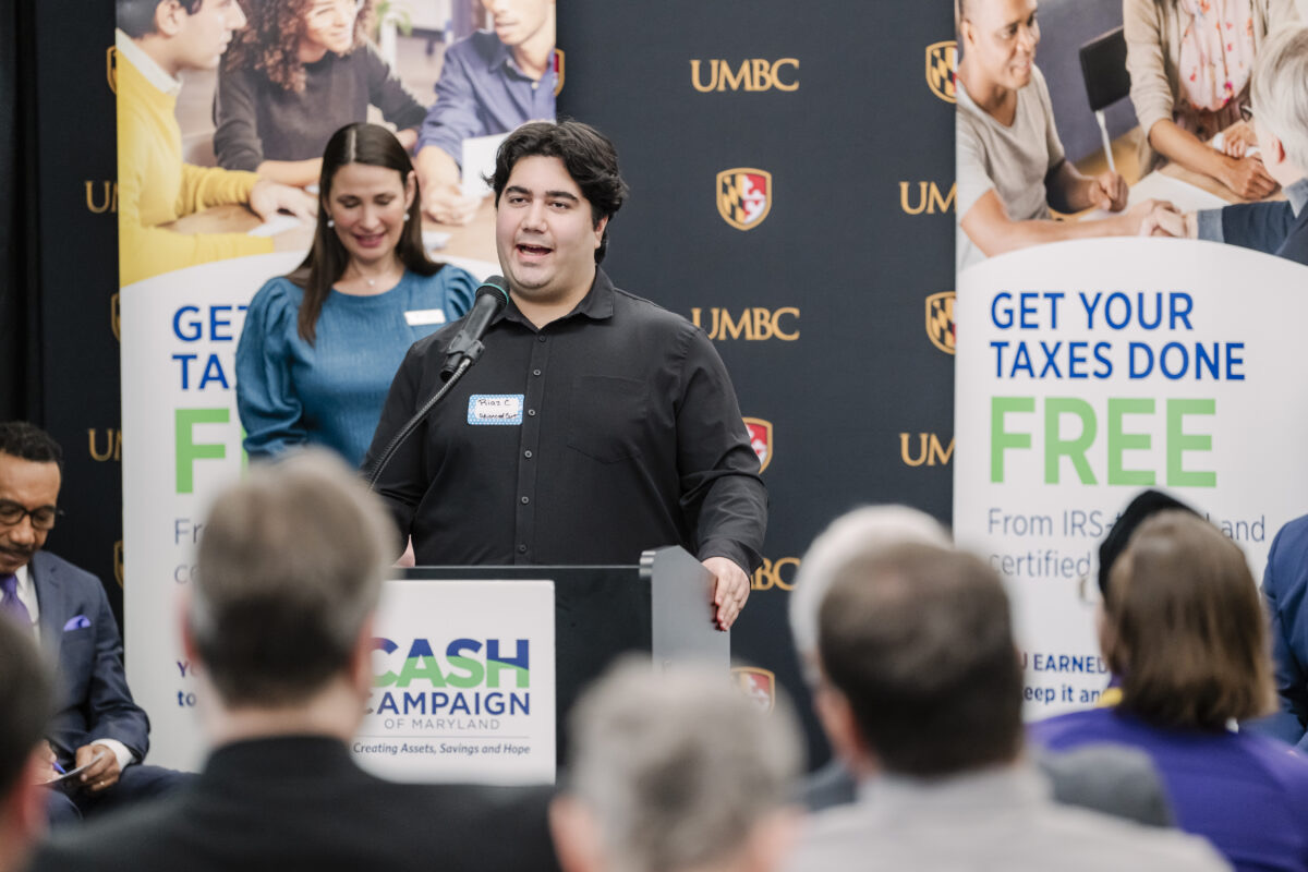 A UMBC VITA volunteer at a community tax-preparation event.